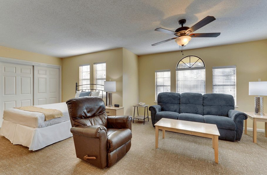 Queen bed and living room area